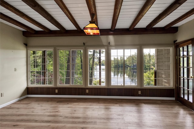 30 Otter Cove Ln, North Berwick, ME 03906 - unfurnished sunroom with beamed ceiling, a deck with water view, hardwood / wood-style floors, and plenty of natural light