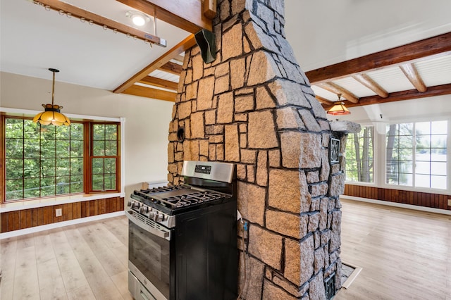 30 Otter Cove Ln, North Berwick, ME 03906 - kitchen with stainless steel gas range, wood finished floors, and plenty of natural light
