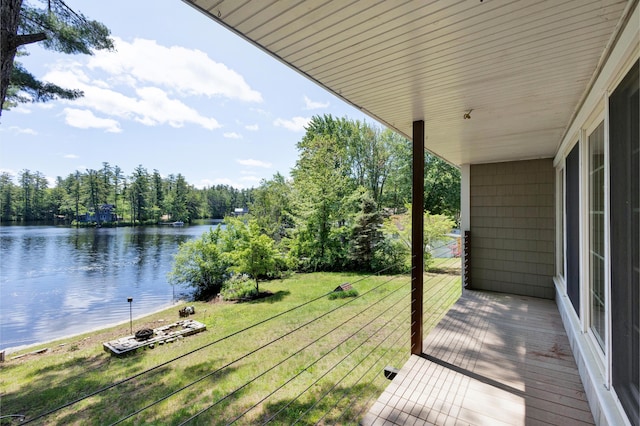 30 Otter Cove Ln, North Berwick, ME 03906 - wooden terrace with a water view, a lawn, and a wooded view