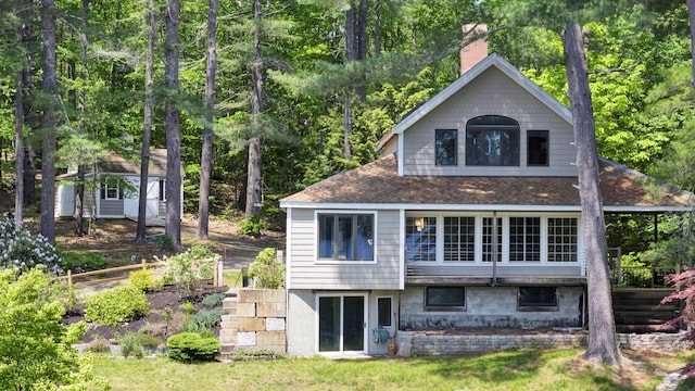 30 Otter Cove Ln, North Berwick, ME 03906 - rear view of property with a chimney and roof with shingles