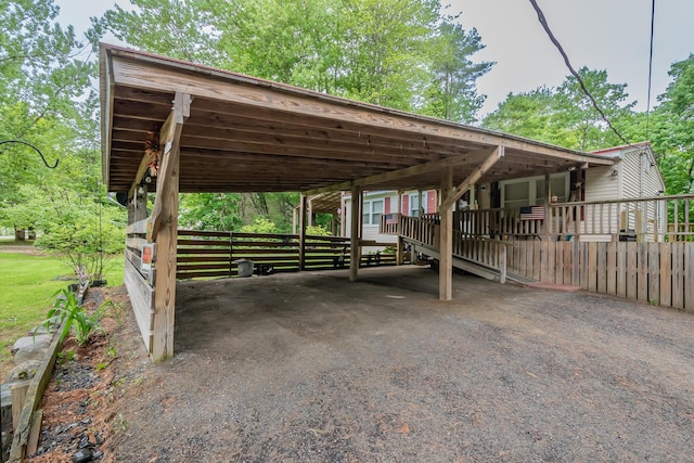 26 Knapp Ave, Milo, ME 04463 - view of parking / parking lot with a carport and asphalt driveway