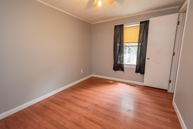 26 Knapp Ave, Milo, ME 04463 - spare room featuring ornamental molding, light wood-style floors, baseboards, and a ceiling fan