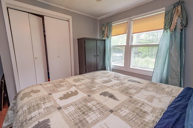 26 Knapp Ave, Milo, ME 04463 - bedroom with ornamental molding and a closet
