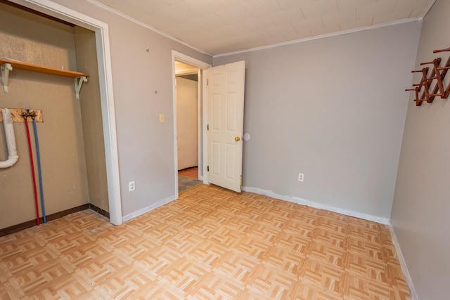 26 Knapp Ave, Milo, ME 04463 - unfurnished bedroom with ornamental molding and baseboards