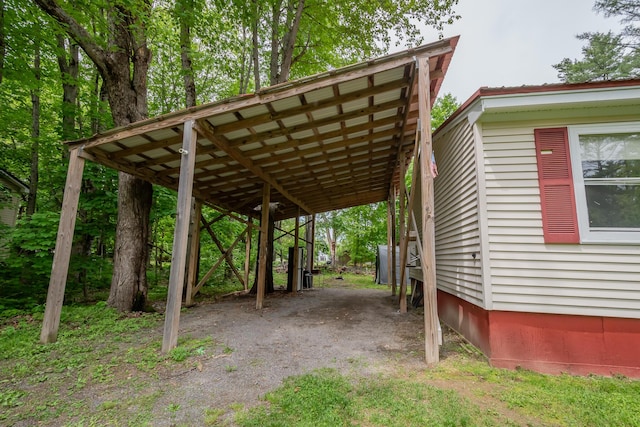 26 Knapp Ave, Milo, ME 04463 - view of parking / parking lot with a carport
