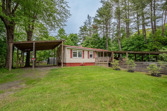 26 Knapp Ave, Milo, ME 04463 - manufactured / mobile home featuring a front yard and a deck