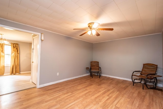 26 Knapp Ave, Milo, ME 04463 - unfurnished room with a ceiling fan, light wood-type flooring, crown molding, and baseboards