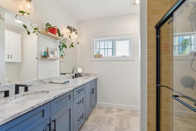 29 Bay Field Dr, Woolwich, ME 04579 - full bathroom with plenty of natural light, double vanity, and a tile shower