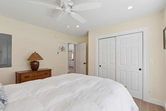 29 Bay Field Dr, Woolwich, ME 04579 - bedroom featuring electric panel, a closet, recessed lighting, wood finished floors, and ceiling fan
