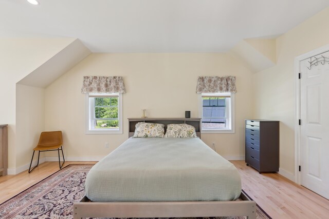 29 Bay Field Dr, Woolwich, ME 04579 - bedroom featuring light wood finished floors, vaulted ceiling, and recessed lighting