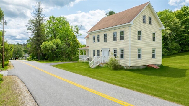 32 Skillings Corner Rd, Auburn, ME 04210 - view of side of property featuring a lawn