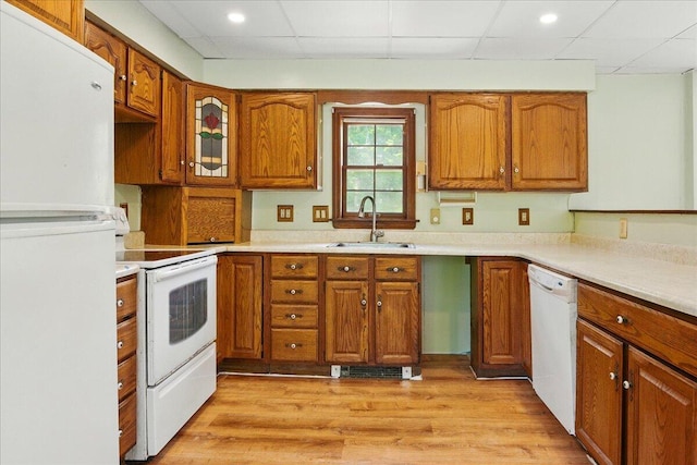 32 Skillings Corner Rd, Auburn, ME 04210 - kitchen with white appliances, a sink, brown cabinets, light countertops, and a paneled ceiling