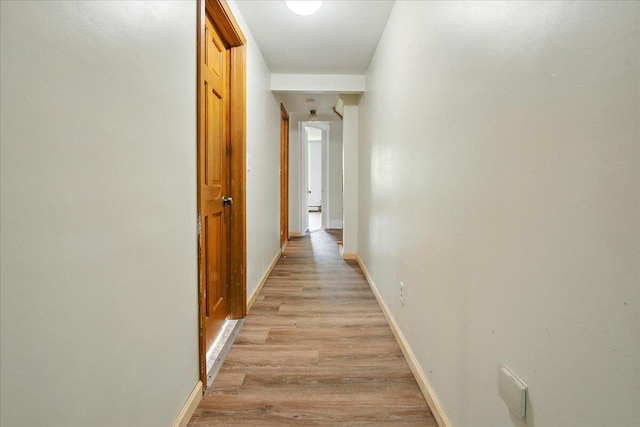 32 Skillings Corner Rd, Auburn, ME 04210 - hall with light wood-type flooring and baseboards