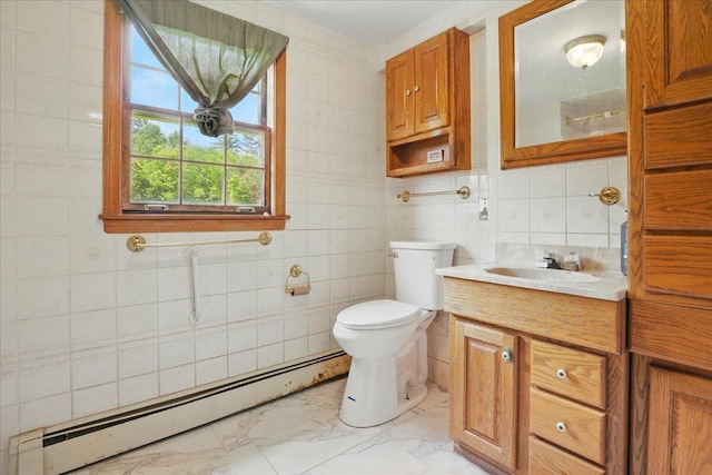 32 Skillings Corner Rd, Auburn, ME 04210 - bathroom featuring a baseboard radiator, tile walls, marble look tiles, vanity, and toilet