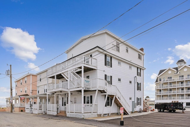 5 Kinney Ave Unit 302, Old Orchard Beach, ME 04064 - view of property featuring stairs
