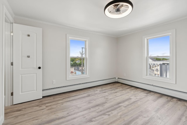 5 Kinney Ave Unit 302, Old Orchard Beach, ME 04064 - unfurnished room with crown molding, light wood finished floors, and a baseboard radiator