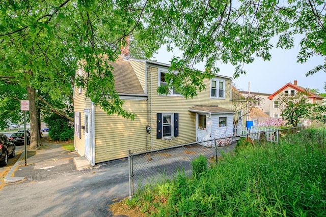 13 Monroe St, Portland, ME 04101 - view of front of house featuring a shingled roof