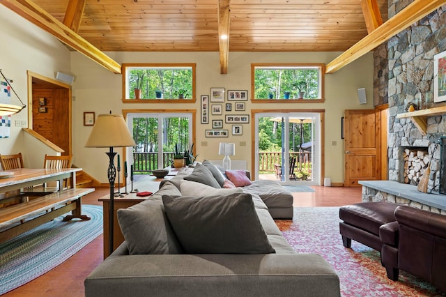 21 Jones Dr, Hartford, ME 04220 - living room featuring a wood ceiling with exposed beams and high vaulted ceiling