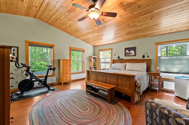 21 Jones Dr, Hartford, ME 04220 - bedroom featuring lofted ceiling, wooden ceiling, wood finished floors, radiator, and a ceiling fan