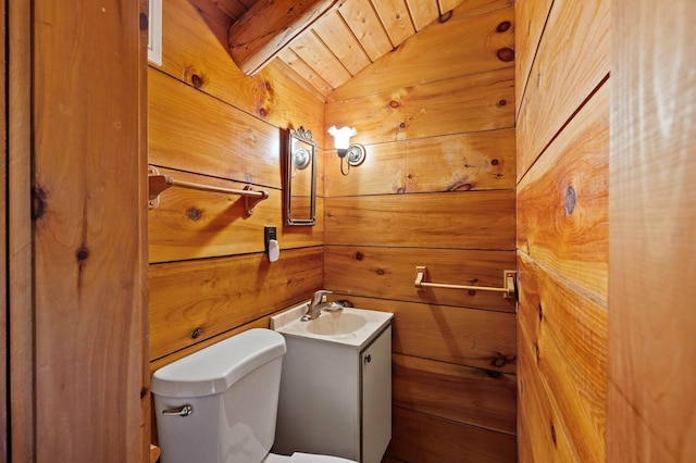 21 Jones Dr, Hartford, ME 04220 - half bathroom featuring wood walls and vanity
