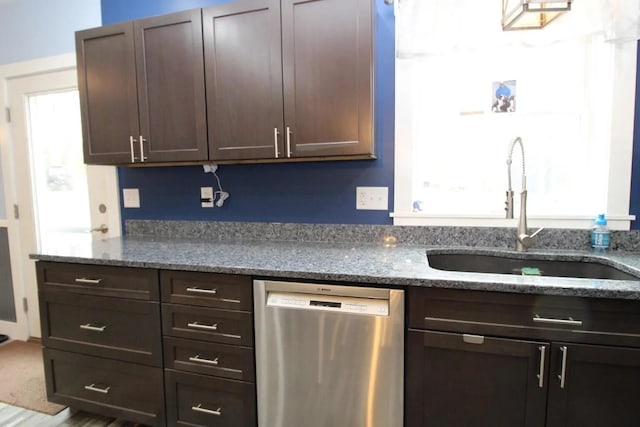 9 Springer Ln, Morrill, ME 04952 - kitchen with dishwasher, a sink, dark brown cabinetry, and stone countertops