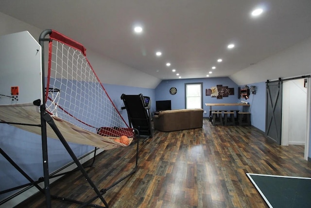 9 Springer Ln, Morrill, ME 04952 - game room with vaulted ceiling, wood finished floors, recessed lighting, and a barn door