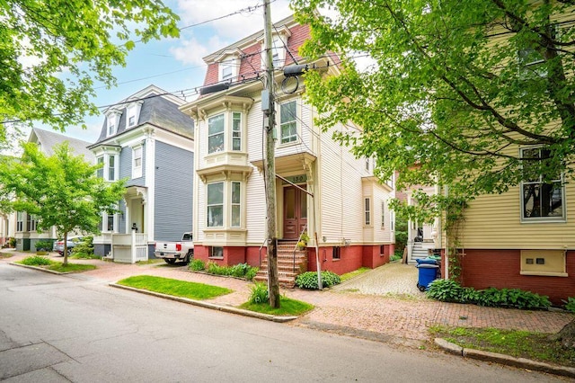 130 Emery St, Portland, ME 04102 - view of front of home with mansard roof and entry steps