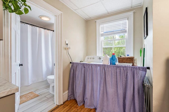 130 Emery St, Portland, ME 04102 - bathroom featuring vanity, wood finished floors, and curtained shower