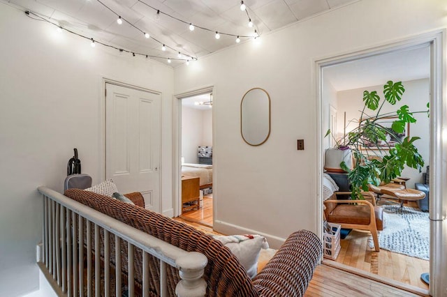 130 Emery St, Portland, ME 04102 - corridor featuring light wood-style floors and rail lighting