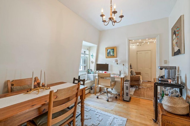 130 Emery St, Portland, ME 04102 - dining area featuring light wood-style floors, a desk, and a chandelier