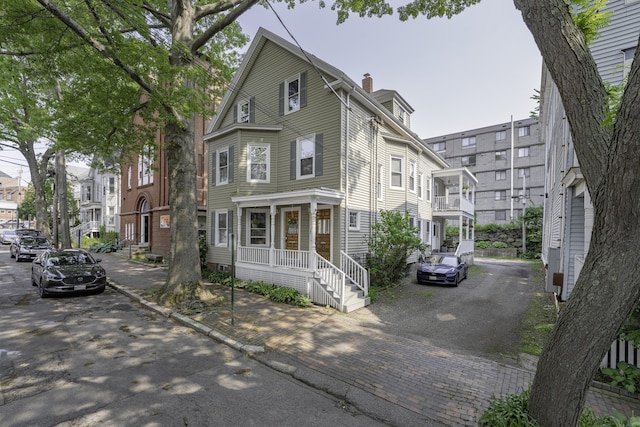 18 Sherman St Unit 4, Portland, ME 04101 - view of front of property with a chimney