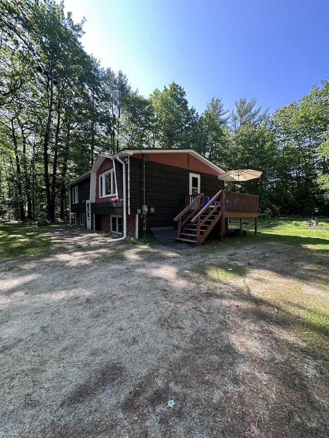 15 Balsam Ln, Naples, ME 04055 - back of property featuring a wooden deck