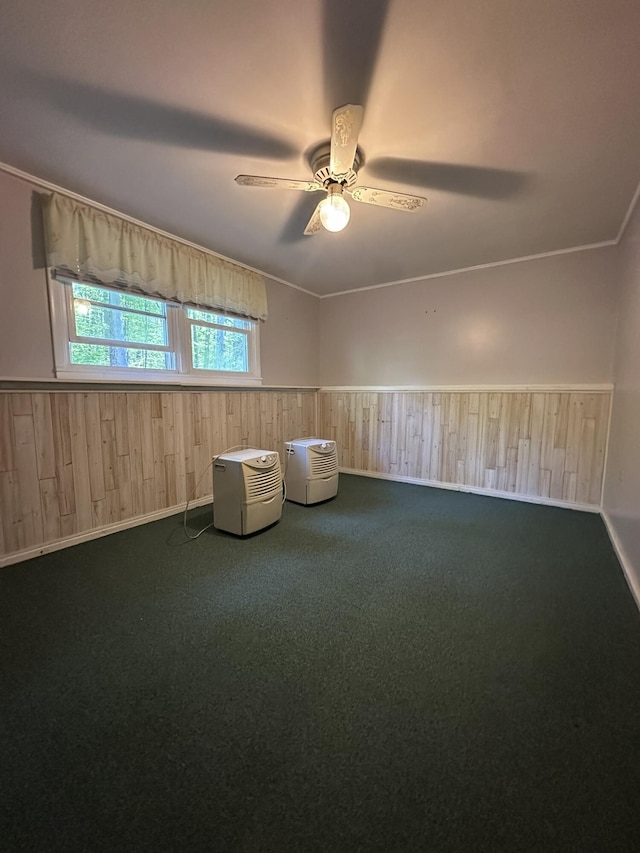 15 Balsam Ln, Naples, ME 04055 - unfurnished room with carpet flooring, wooden walls, and ceiling fan