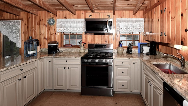 110 Indian Point Dr, Denmark, ME 04022 - kitchen with appliances with stainless steel finishes, a sink, wooden ceiling with exposed beams, wooden walls, and light stone countertops