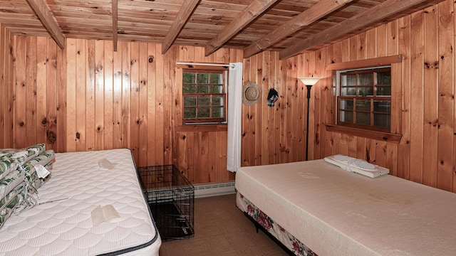 110 Indian Point Dr, Denmark, ME 04022 - bedroom with wood ceiling with exposed beams, wooden walls, a baseboard radiator, and tile patterned floors