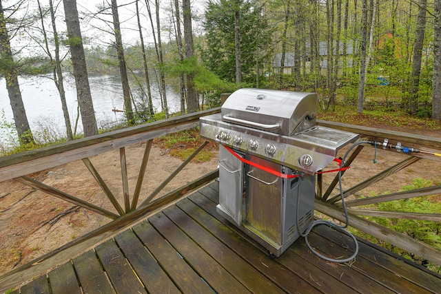 110 Indian Point Dr, Denmark, ME 04022 - wooden terrace with a water view and a grill