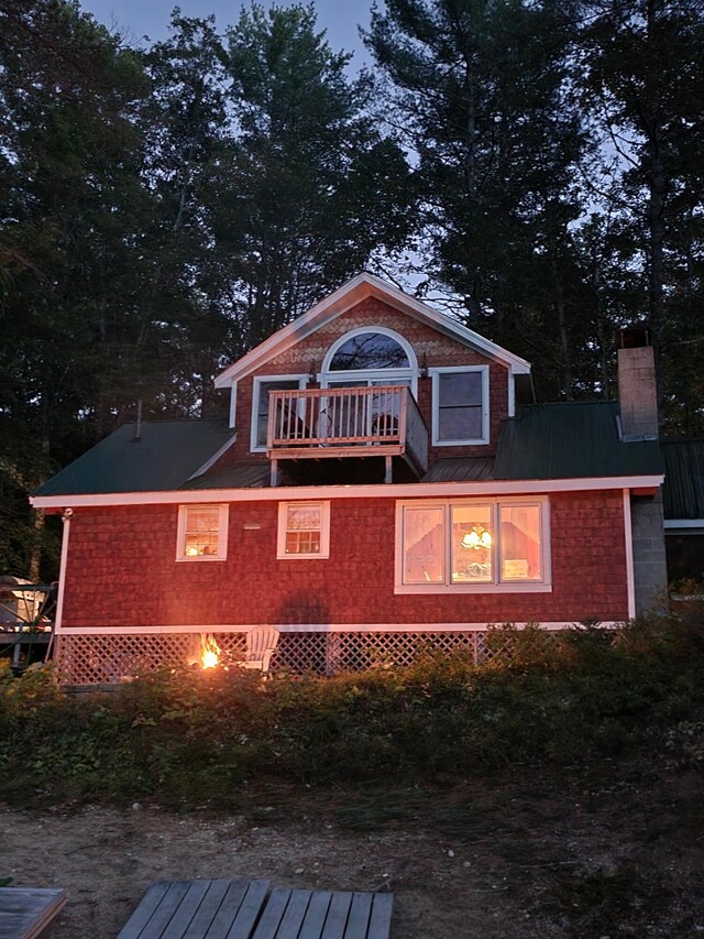 110 Indian Point Dr, Denmark, ME 04022 - back of house with a balcony and a chimney