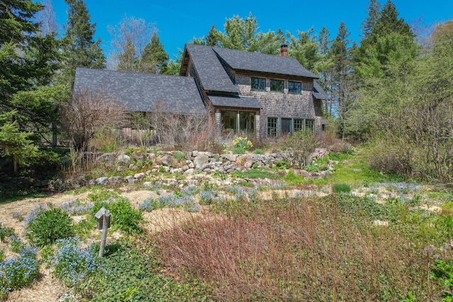 12 Bakers Pt, Steuben, ME 04680 - rear view of property with a shingled roof and a chimney