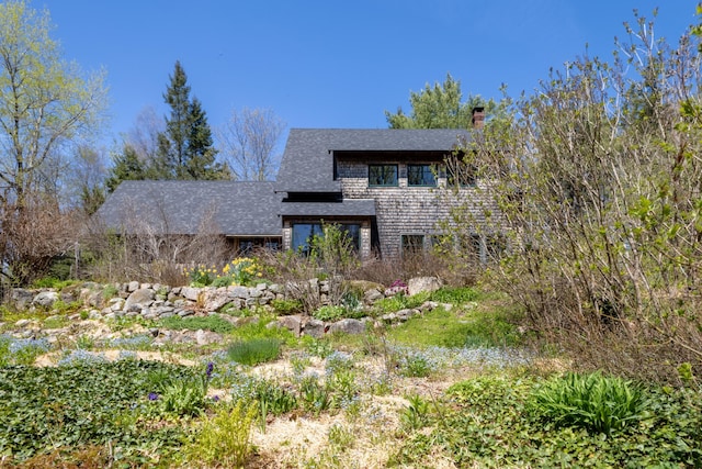 12 Bakers Pt, Steuben, ME 04680 - rear view of property with a chimney