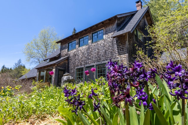 12 Bakers Pt, Steuben, ME 04680 - view of home's exterior featuring a chimney