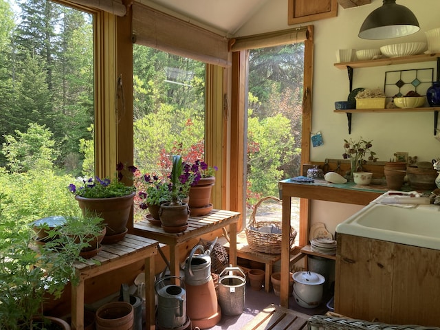 12 Bakers Pt, Steuben, ME 04680 - sunroom / solarium featuring lofted ceiling and plenty of natural light