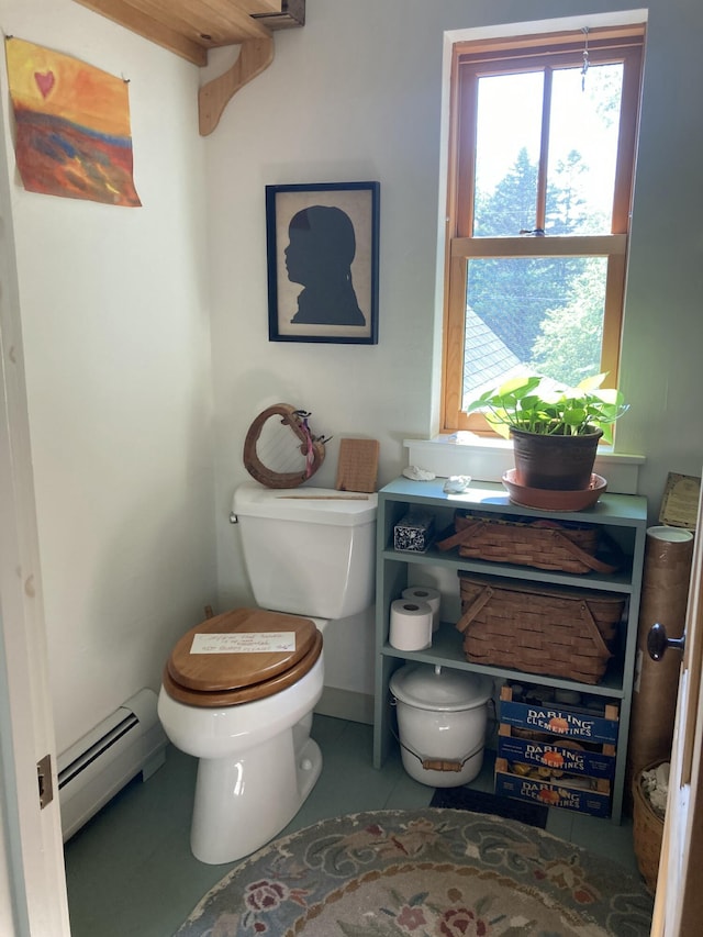 12 Bakers Pt, Steuben, ME 04680 - half bathroom with baseboard heating and tile patterned flooring
