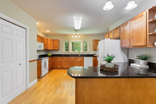 8 Kavanaugh Rd Unit 8, Old Orchard Beach, ME 04064 - kitchen featuring white appliances, open shelves, a peninsula, and light wood finished floors