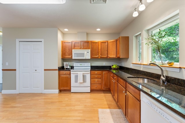 8 Kavanaugh Rd Unit 8, Old Orchard Beach, ME 04064 - kitchen featuring white appliances, light wood finished floors, brown cabinetry, and recessed lighting