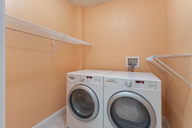 8 Kavanaugh Rd Unit 8, Old Orchard Beach, ME 04064 - washroom featuring washing machine and dryer and light tile patterned floors