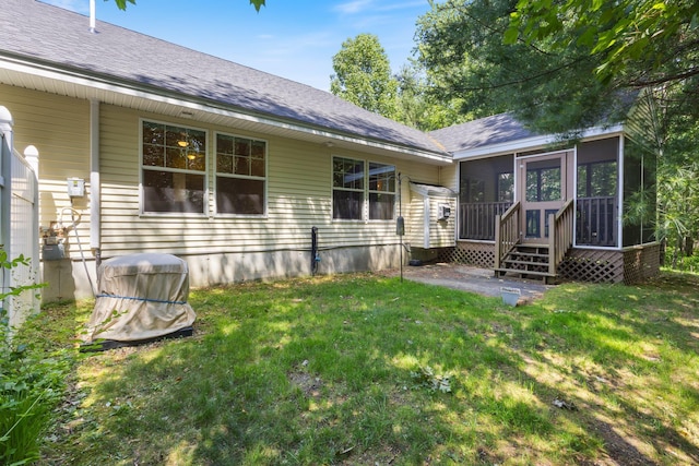 8 Kavanaugh Rd Unit 8, Old Orchard Beach, ME 04064 - back of house with a sunroom, a lawn, and roof with shingles