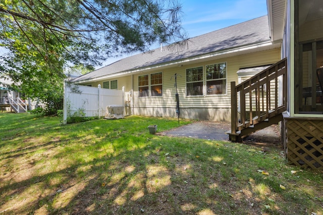 8 Kavanaugh Rd Unit 8, Old Orchard Beach, ME 04064 - view of home's exterior featuring a patio and a shingled roof