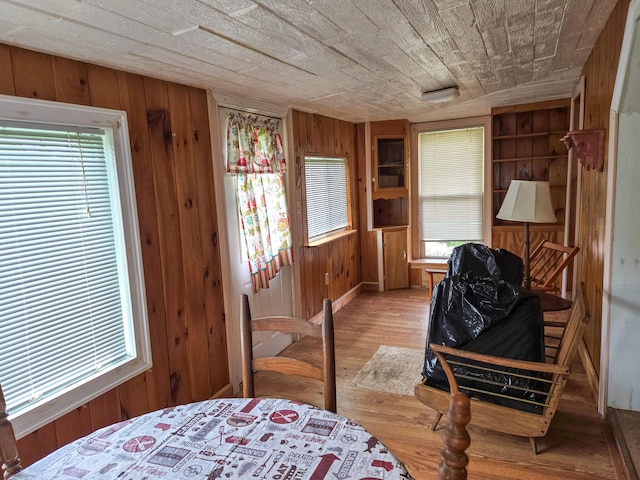 291 Pea Ridge Rd, Chester, ME 04457 - living area featuring wooden walls, wood finished floors, healthy amount of natural light, and wood ceiling