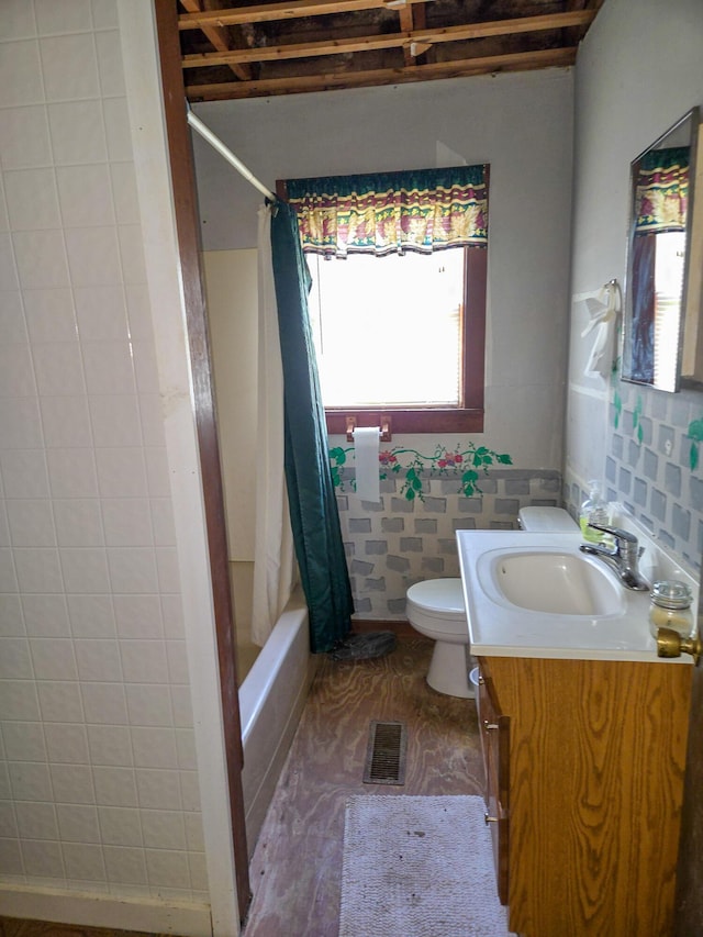 291 Pea Ridge Rd, Chester, ME 04457 - bathroom featuring toilet, vanity, and shower / bath combo with shower curtain