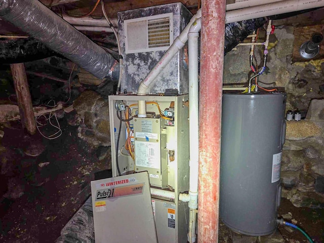 291 Pea Ridge Rd, Chester, ME 04457 - utility room with water heater
